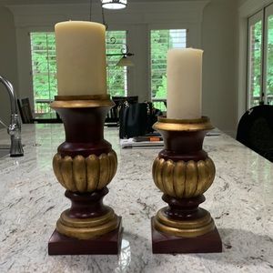 LARGE set of 2 candlesticks. They are a deep red with bronzy gold.
